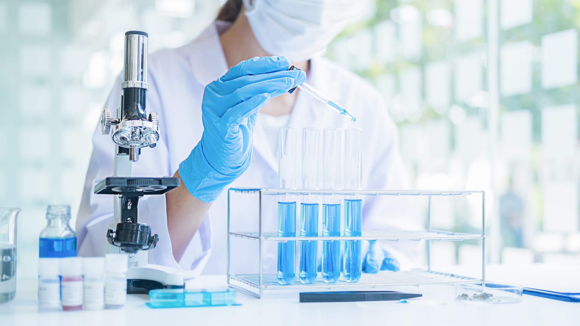 Medical or Scientific Researcher or Man Doctor Looking at a Test